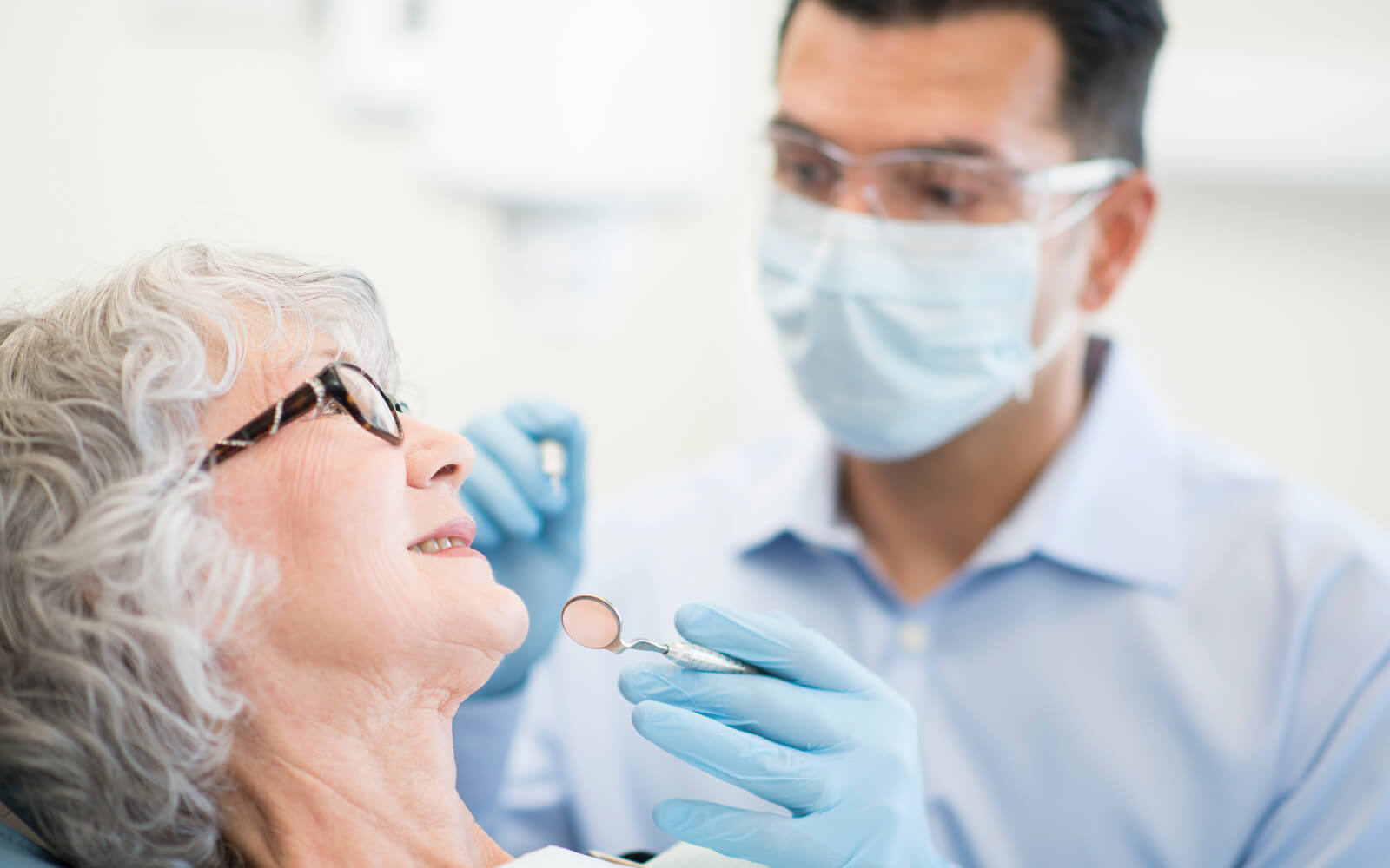 Mature woman getting a dental exam
